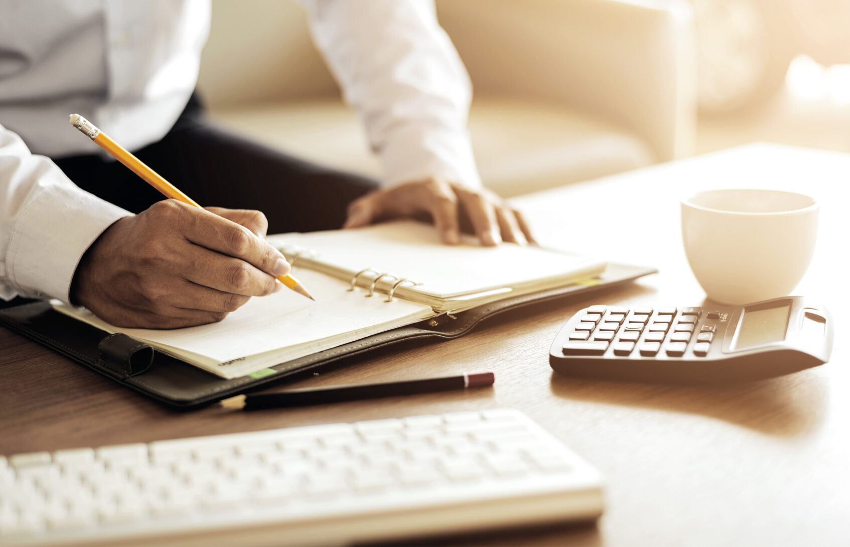 Close-up of a businessman working in an office.